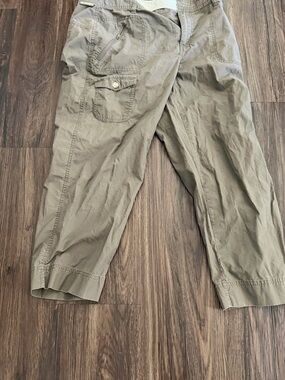 Women’s Olive Green Cargo Pants - Columbia has a front zippered pocket and snap